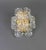 A stunning pair of golden sconces with crystal glasses, made by kinkeldey, germany, circa 1970-1979. It’s composed of...