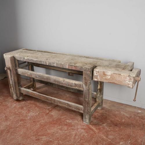 This impressive vintage carpenter's workbench is an authentic piece of industrial antiques, perfect for those seeking a...