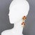 Rochas Paris designed those fabulous dangle clip-on earrings. The rare pieces feature an extra-long dangling drop shape...