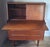 Teak secretary desk / bureau by AG Aarhus, Denmark 1960s. The desk has a pull-out writing surface and a hidden mirror...