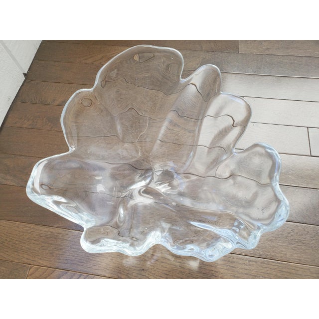 Stunning hand made vintage glass bowl. Free form shape makes it timeless and fresh. Tiny bubbles in the glass and the...