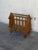 Vintage Danish magazine rack crafted from solid oak featuring traditional Scandinavian craftsmanship and charming turned...