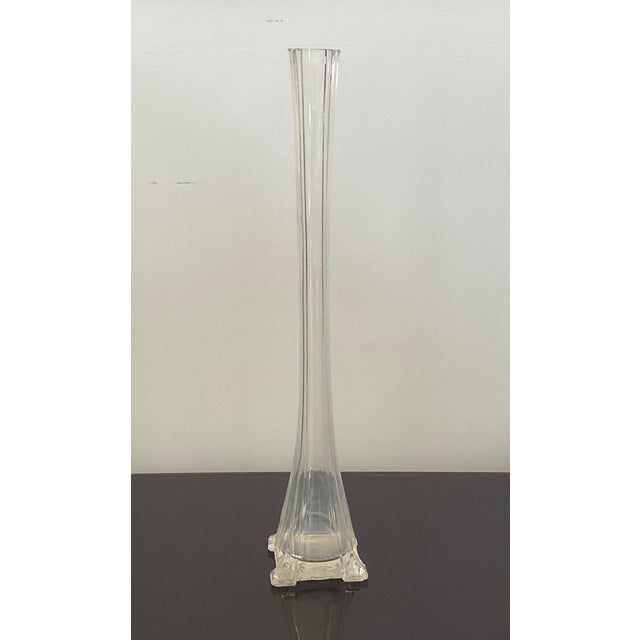 A nice tall bud vase. Makes a great display when in a grouping. Top dia 1.50" Bottom dia 3.25" Height 17.75” Additional...