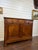 This is a beautiful 19th century French server featuring a three upper drawers above two doors that opens into storage....