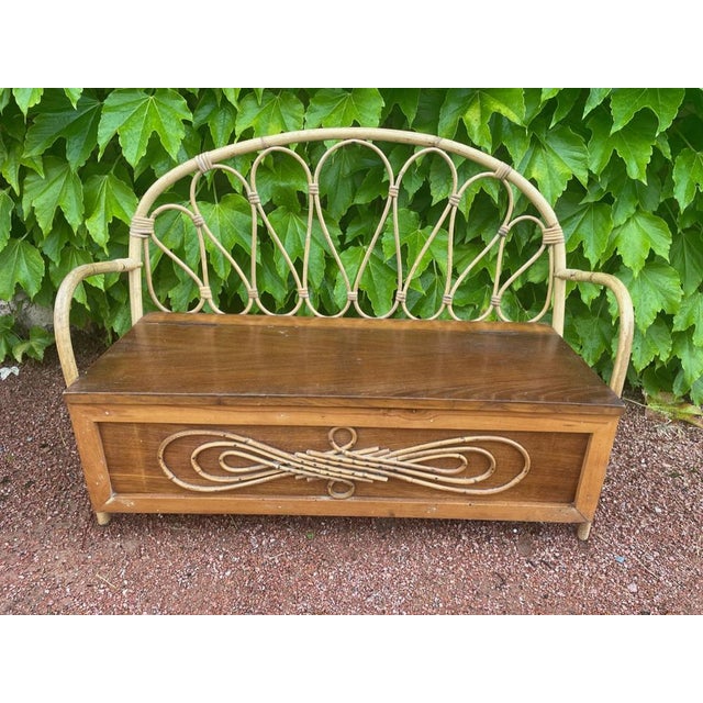 Nice little bench and wood and rattan from the 50s, with storage.