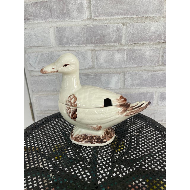 Sweet Italian duck tureen more suited for sauces than soup. Lovely for a game or holiday dinner. Simple colors with brown...