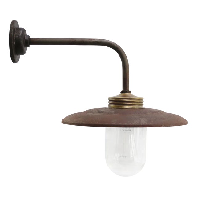 Vintage Industrial Rust Iron and Brass Glass Sconce with Clear Striped Glass Bulb For Sale