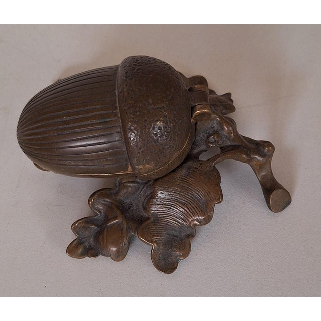 Antique Art Nouveau Lidded Box in the Shape of an Acorn on a Bronze Leaf, 1900s, in Very Good conditions. Designed 1890 to...