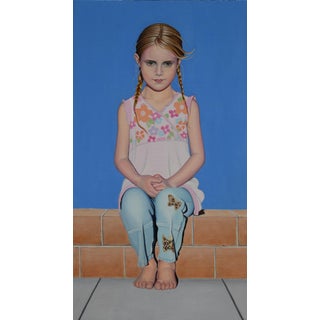 Blue Sky by Suzy Smith | Oil on Panel Portrait of a girl sitting against a blue background For Sale