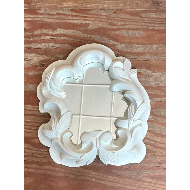 This stunning vintage wall mirror, designed in the evocative style of the legendary French designer Serge Roche, is a...