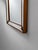 A refined vintage mirror with a beautifully understated presence, combining clear glass with a warm wooden frame. The...