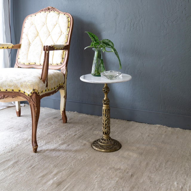 A heavy crystal ashtray or catchall composed of triangular faceted surfaces that form a three-dimensional, hexagonal shape...