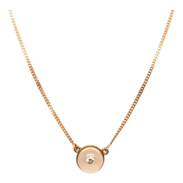 18 Karat Yellow Gold 14 inch Free Form Charm with One Round Diamond 0.02 TDW. 6.36 grams total weight.