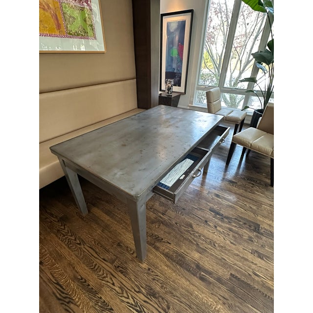 Vintage Industrial Metal Table with Drawers Elevate your space with this striking vintage metal dining table, a perfect...