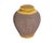 A studio pottery jar by the American ceramicist Barry Vantiger. This rounded jar features a textured, brown design, which...