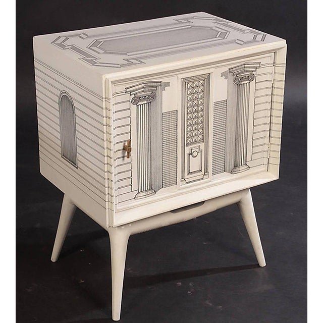 A pair of architectural end tables in the manner of Fornasetti, architectural renderings all hand-painted.