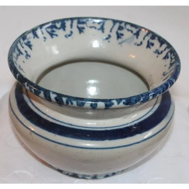 This 19th century sponge ware pottery spittoon.