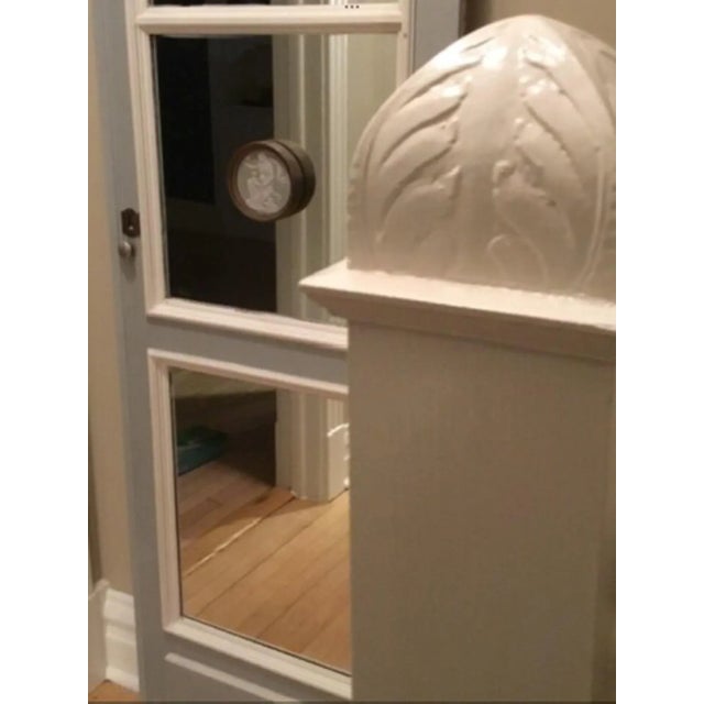 French blue and Cream painted Mirrored Door with Unique Cameo Medallion. Vintage door in original paint and softly aged...