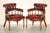 Stunning pair of hand made in England, Oxblood Leather, Chesterfield captains armchairs with the very unique solid brass...