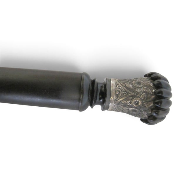 Victorian era walking stick with melon style handle. I believe the handle is bullhorn (or lacquered wood) with a sterling...