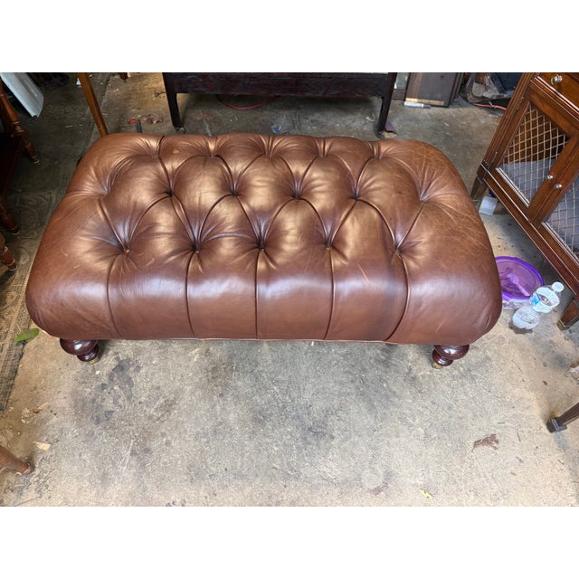 Vintage Chesterfield Syle Tufted Leather Ottoman Footstool Turned legs , sturdy and strong Approximate measures: 43''...
