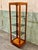 Vintage and rare narrow Lane display case with an open design and three adjustable smoked glass shelves, atop a recessed...