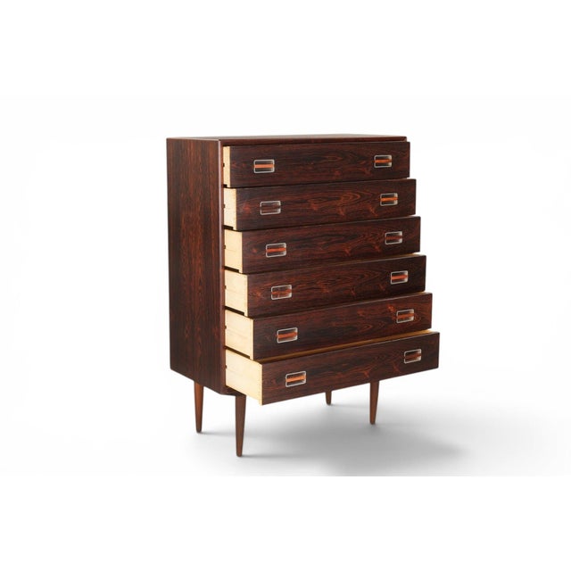 This 1960s Danish chest of drawers makes a strong case for rosewood as the defining material of the era, with six...