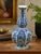 A handsome blue and white Delft-style ceramic vase made exclusively for Baker Knapp & Tubbs and produced in Holland. This...