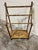 This is a perfect little glammy freestanding towel rack. Heavy iron gilded in gold.Three bars for hanging towels and a...