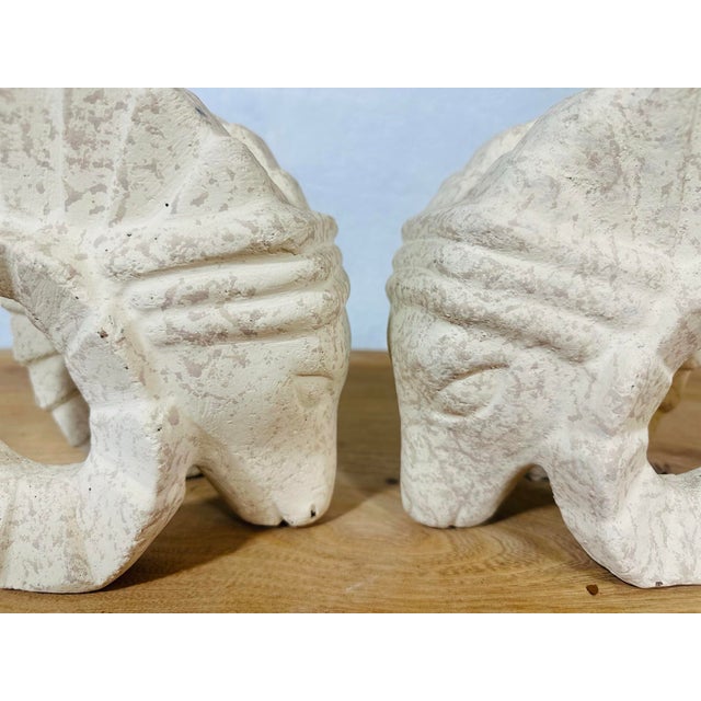 This striking pair of ram’s head sculptures exudes a bold and sculptural presence, showcasing an artful balance between...