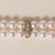 Elegant Double Strand Pearl & Diamond Bracelet in 18K Gold An exquisite fusion of luminous pearls, brilliant diamonds, and...