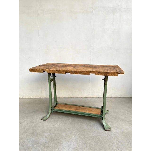Large industrial table made from Victorian pine joists & cast iron industrial legs from the early 1900s still in their...