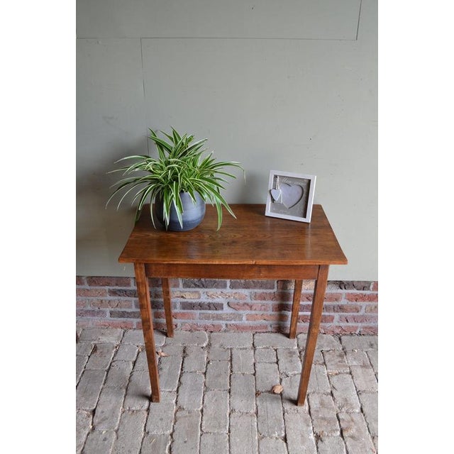 of a 19th-century oak writing desk. The height of the desk is 68 cm. The width of the desk is 75 cm. The depth of the desk...