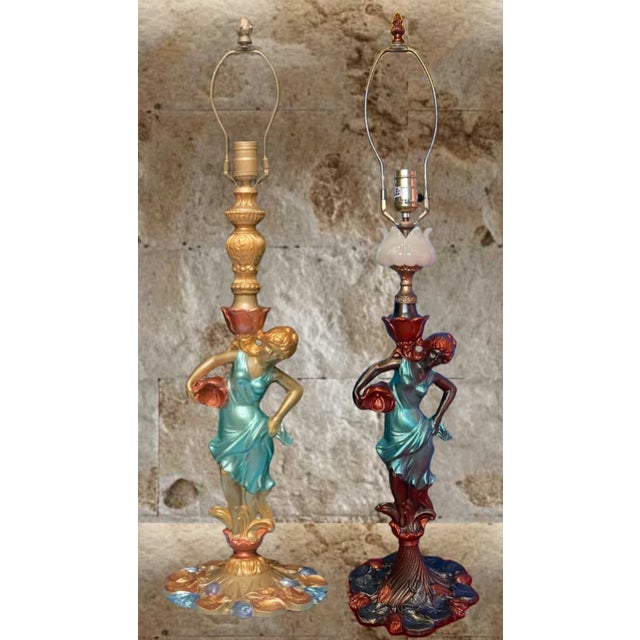 Each exquisite mid-century spelter lamp showcases enchanting water nymphs, adorned in identical diaphanous gowns of...