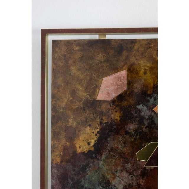 Decorative panel entitled “Fragmentations – IX” in inlaid and patinated brass. Glossy varnish finish. This piece is...