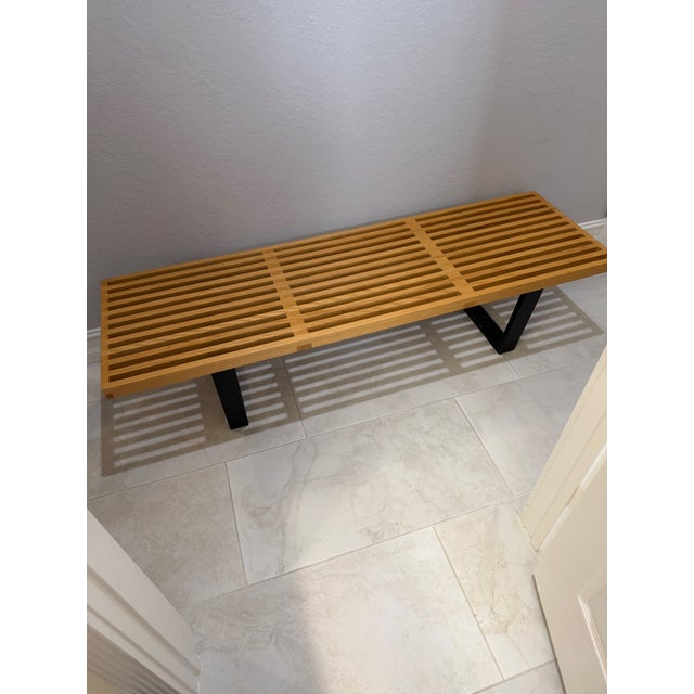 This wooden bench attributed to Herman Miller George Nelson Platform is a stylish and contemporary piece of furniture,...