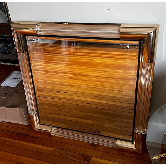 Disco era Charles Hollis Jones style mirror featuring lucite details and gold mirrored panels (the bit that looks like...