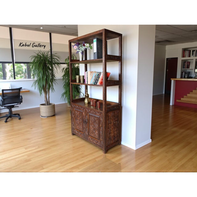 This is a charming Afghan Hand Carved antique-look bookshelf that is made out of cedar. The antique-look Bookshelf is 180...