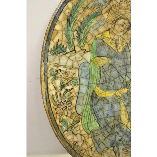 Early 20th Century Antique Persian Iznik Qajar Style Ceramic Pottery Oval Tile Kneeling Woman C3 For Sale - Image 5 of 11