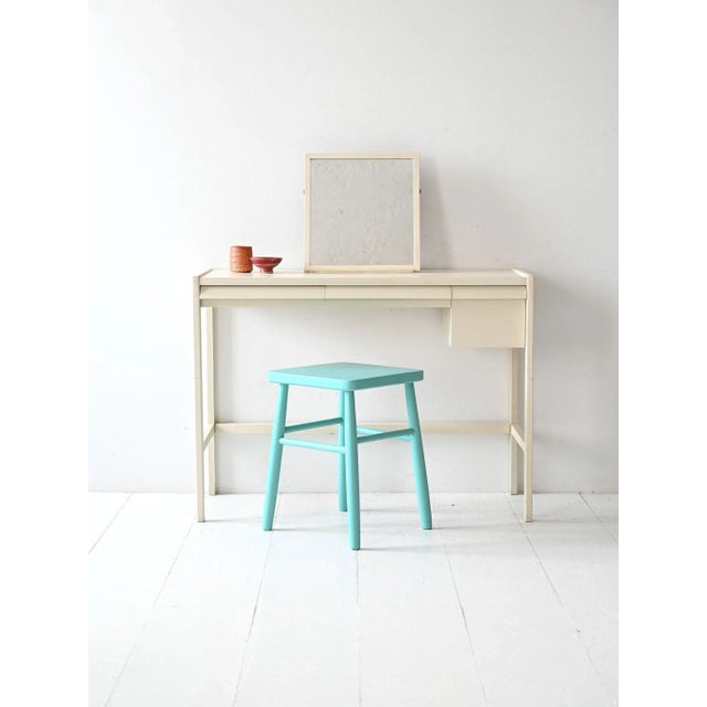 1960s dressing table with adjustable mirror, large side drawer, and low central drawer, designed by Bertil Fridhagen for...