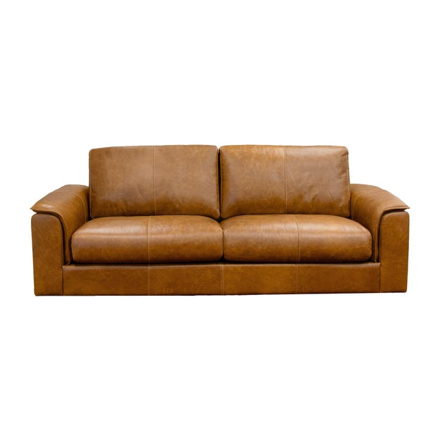 Expertly handcrafted and upholstered in premium top-grain leather, the Hudson Sofa showcases enduring craftsmanship...