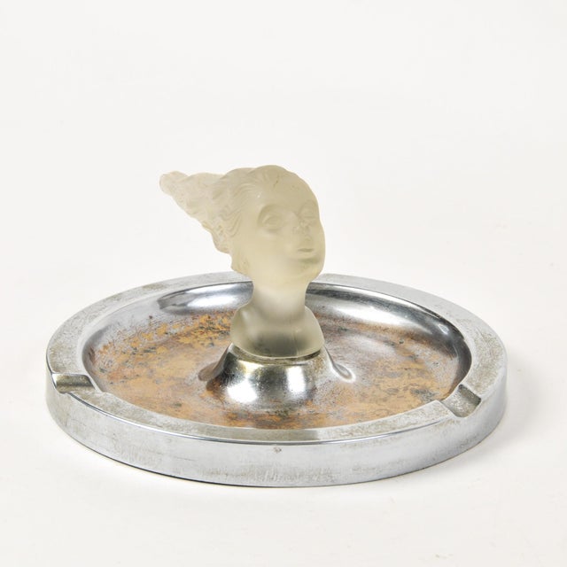 Incredible frosted glass "lady nicotine" head on a chrome ashtray. This vintage ashtray likely dates from 1930's....