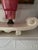 This nostalgic “magic carpet” tv lamp features a cream colored, sculptural ceramic base, inspired by the flowing shape of...