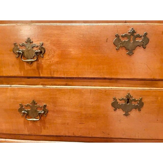 Chest-on-Chest, New Hampshire maple, circa 1780, 74.5" high. Lower section with three drawers, resting on four 10"...