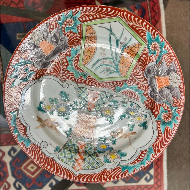 A pair of 19th century Chinese export Imari plates with floral design. Circa 1830.