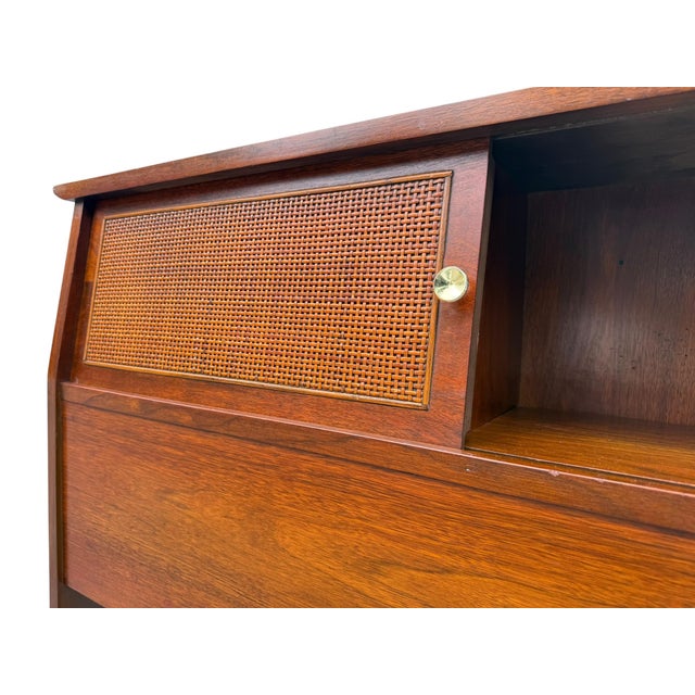 A handsome mid-century modern bookcase headboard by Mainline, the sought-after modern line from Hooker Furniture. It was...
