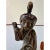Vintage hand-carved wood figure of an elderly fisherman carrying a large fish and a hanging wooden vessel from a long...