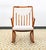 Beautiful solid teak rocking armchair designed by Benny Linden, An iconic and well known maker of Scandinavian furniture....