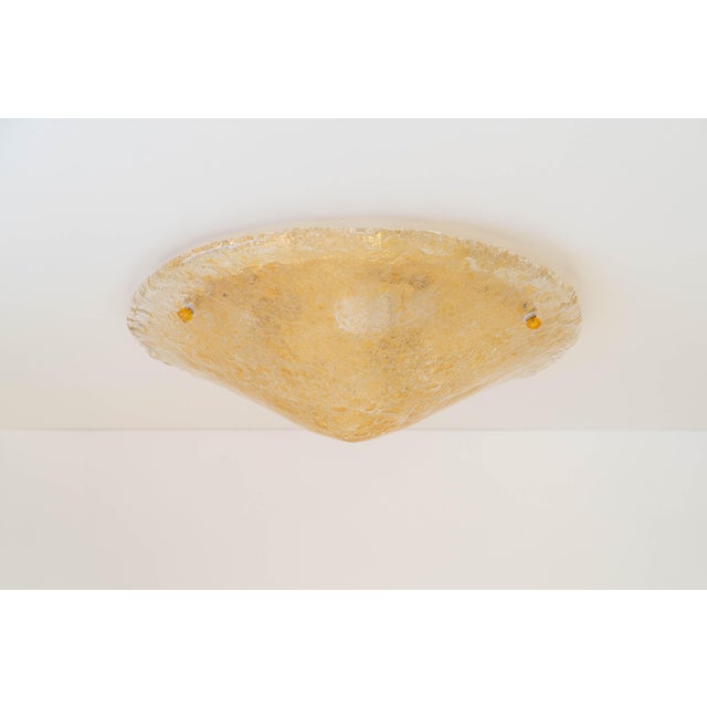 Italian murano glass flush mount ceiling light by sylcom light: a shallow cone of clear glass with amber glass fragments,...