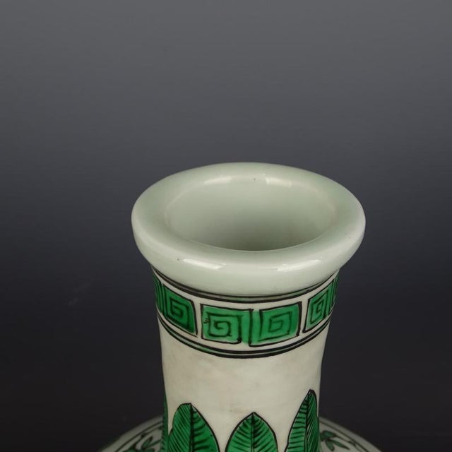 W-22cm,H-30cm The Xuande Marked Green Color Porcelain Tianqiu Vase with a hand painted dragon pattern is a stunning piece...